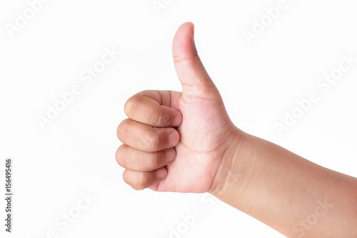 Child's hand showing thumb up, like, isolated on a white background © Tanawut