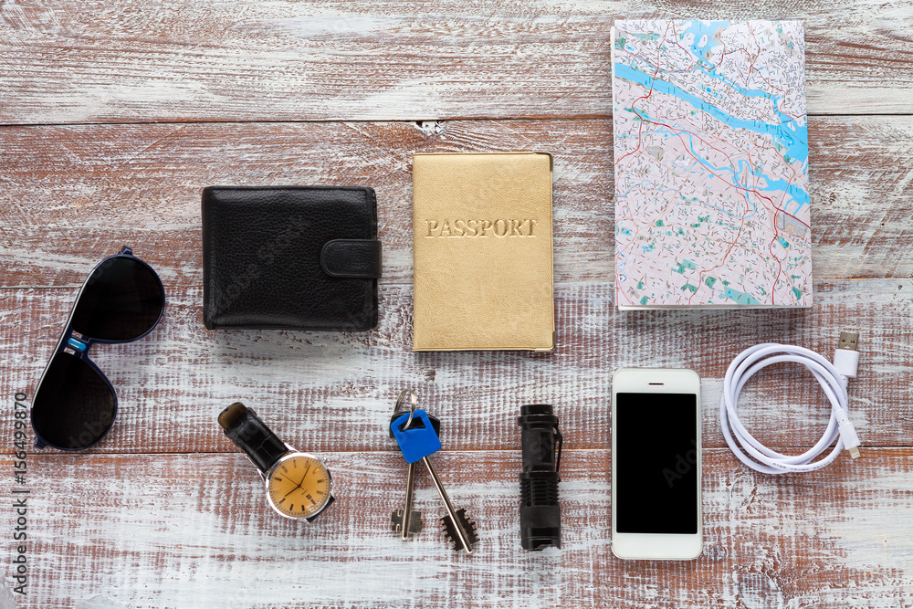objects for travel isolated on a wooden background objects for travel isolated on a wooden background