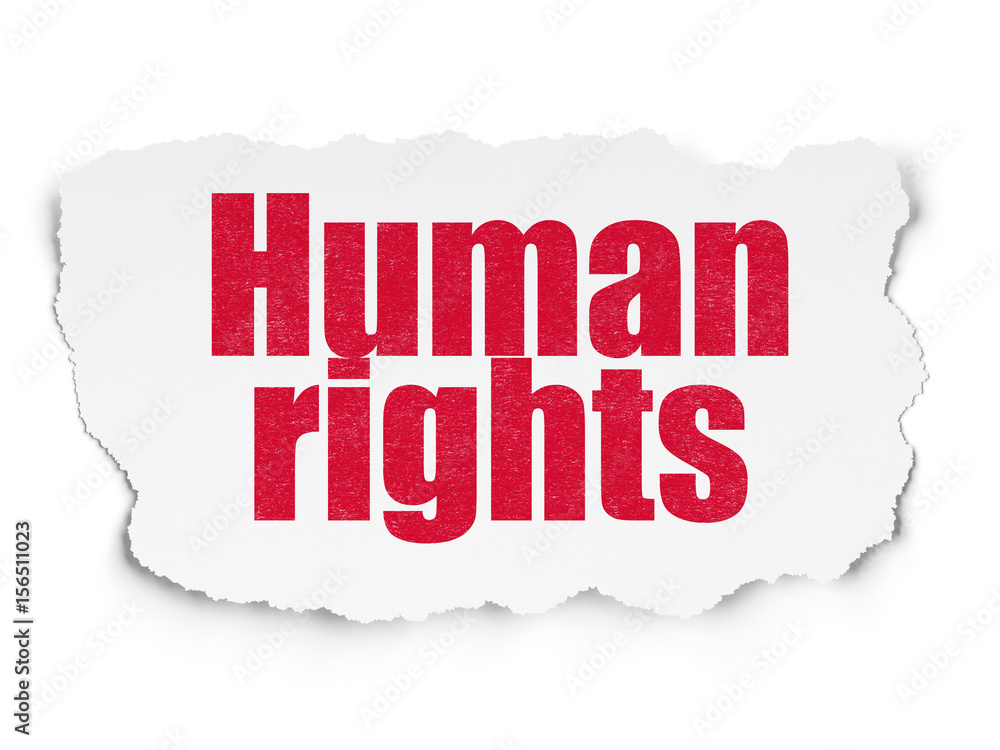 Political concept: Human Rights on Torn Paper background Political concept: Human Rights on Torn Paper background