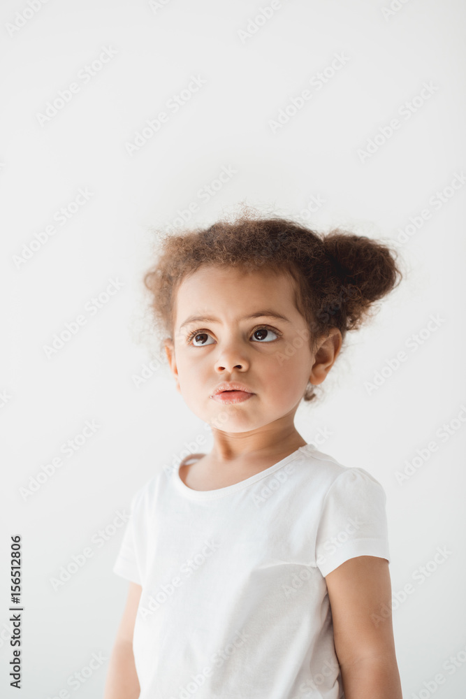 adorable little kid girl looking aside isolated on white adorable little kid girl looking aside isolated on white