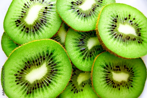 Kiwi fruit slices close up photo