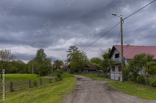 view on a croatian village with a stormy angry sky