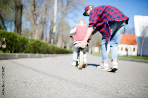 Wallpaper Mural Blurred image of father, son , Torontodigital.ca