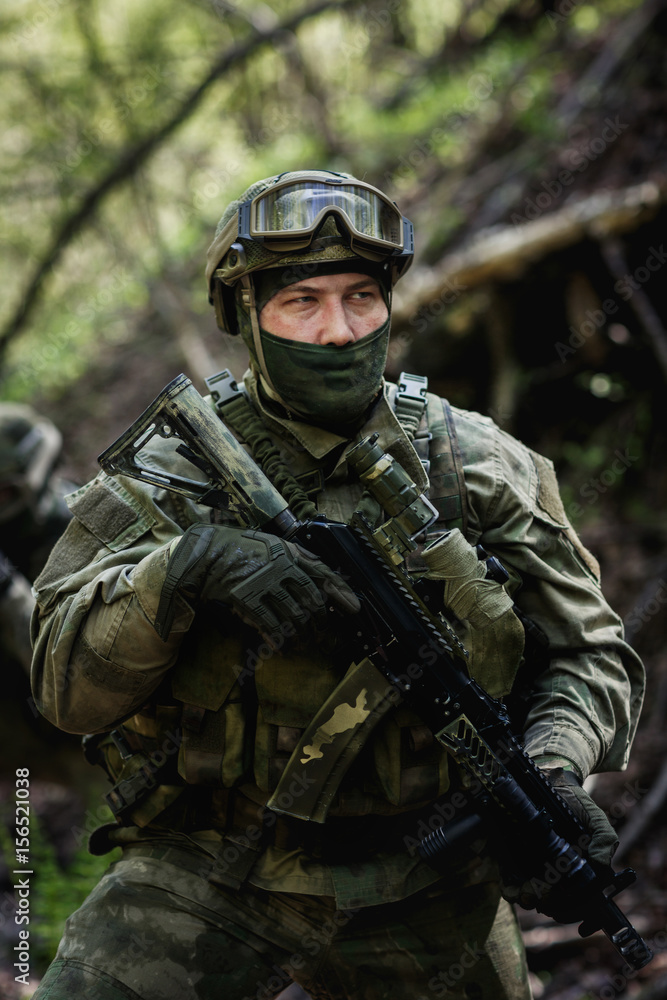 Photo of soldier in camouflage