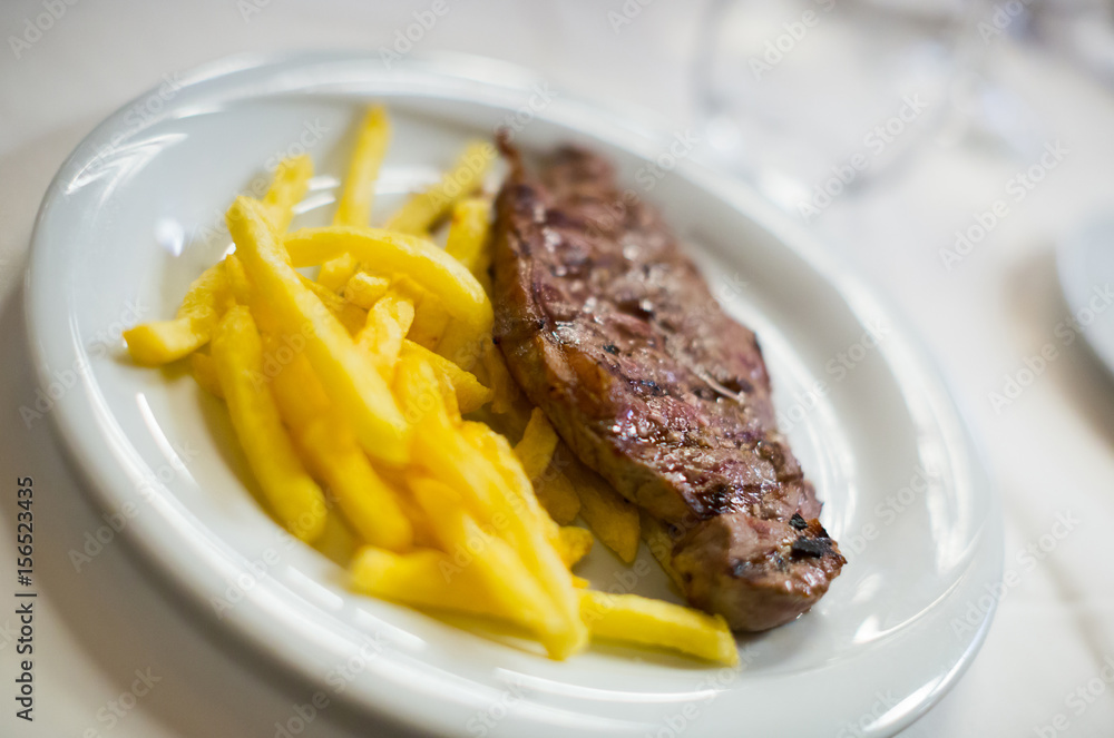 steak and fried potato