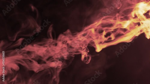 Vapor like smoke fire red styling on a dark black background. Vape smoke rings in motion at vape clouds.