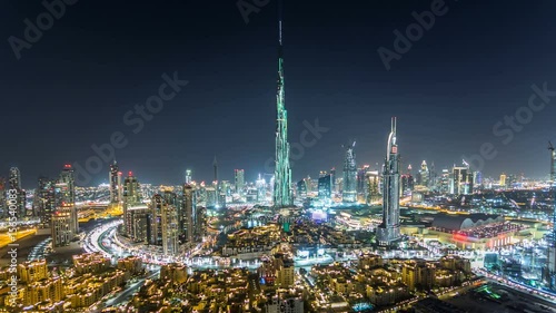 Dubai Downtown at night timelapse view from the top in Dubai, United Arab Emirates photo