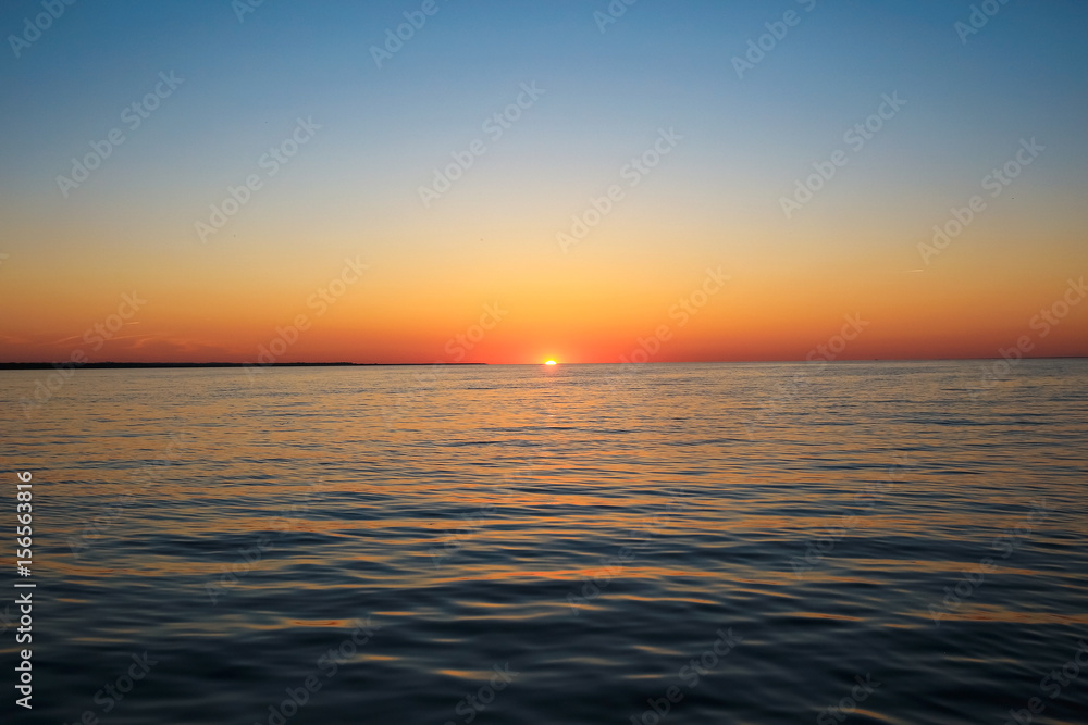 Beautiful sunset on the lake shore