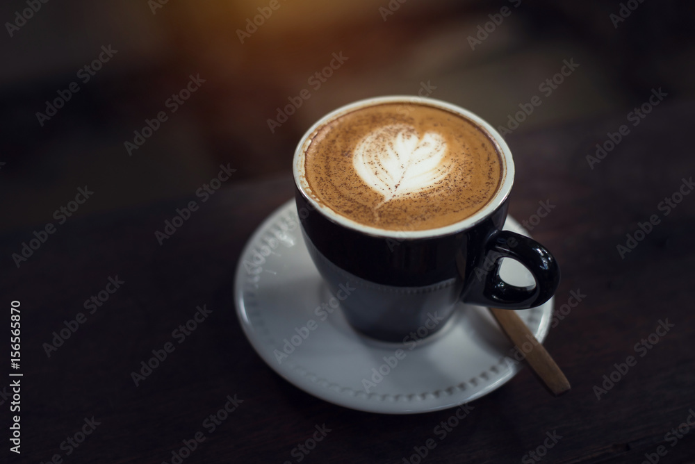Hot coffee on wooden table Hot coffee on wooden table