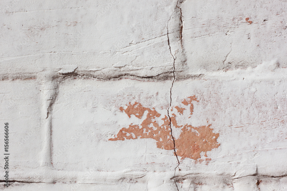 Fototapeta premium Wall of a brick stove in a whitewash