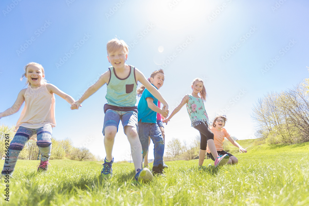 Group of child have fun on a field