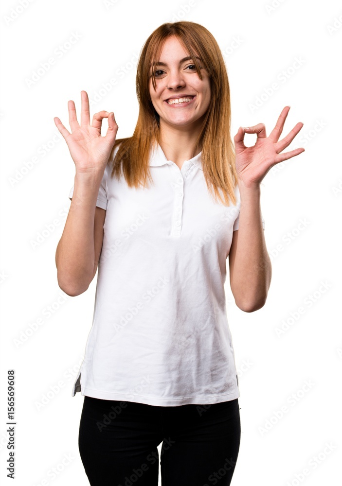 Beautiful young girl making OK sign Beautiful young girl making OK sign
