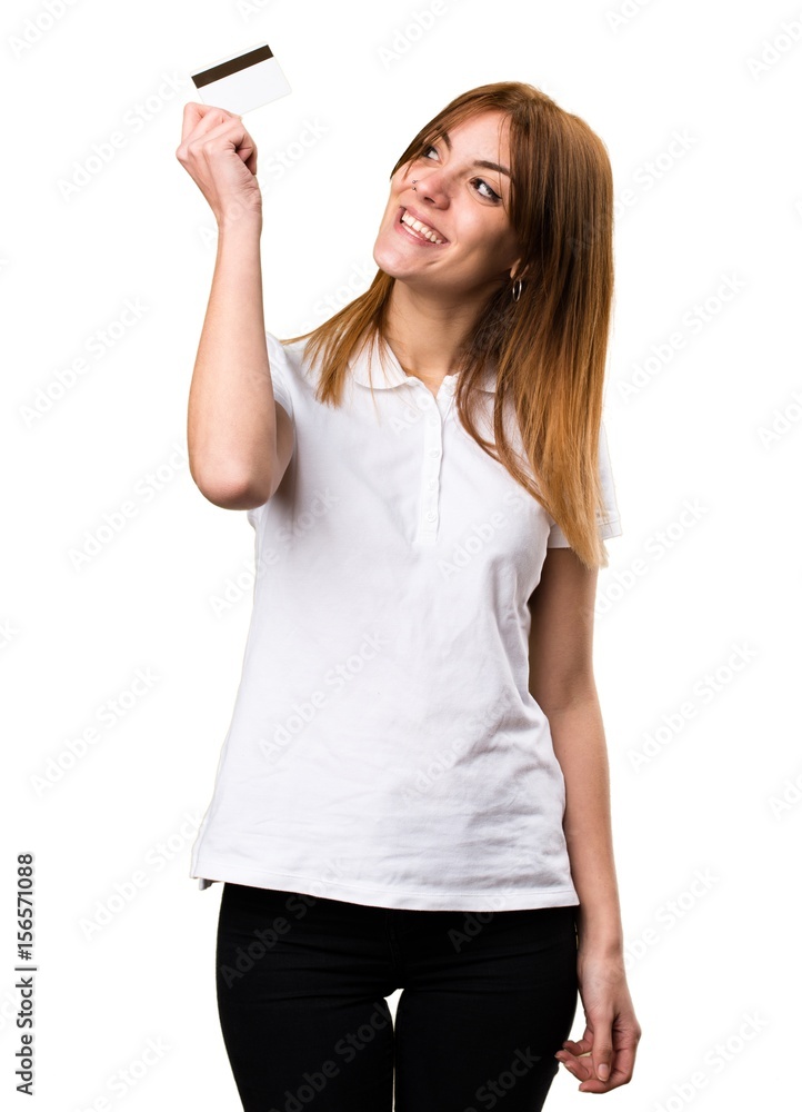 Happy Beautiful young girl holding a credit card Happy Beautiful young girl holding a credit card
