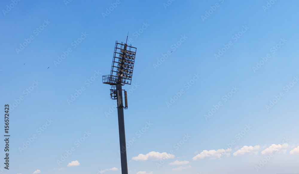 Fototapeta premium Spotlight on lighting tower of stadium