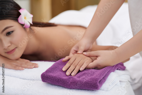 Enjoying Hand Massage in Beauty Salon