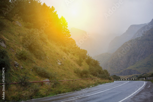 Cinematic road landscape. Road throuth the mountains