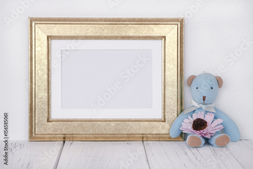 Stock photography golden picture frame cute blue bear holding flower mock up for text message