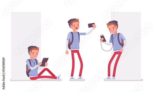 Teenager boy using different gadgets