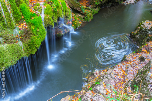 Fototapeta Naklejka Na Ścianę i Meble -  Bigar waterfalls in Romania, and autumn foliage