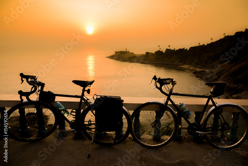 bicycle silhouette on a sunset, Phuket Thailand © Jiggo_Putter