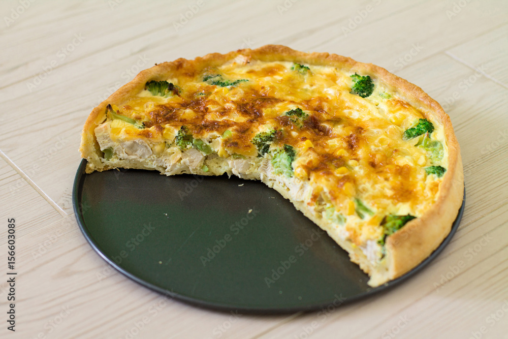 custom made wallpaper toronto digitalTraditional French quiche Lorraine with chicken, egg, milk, cheese broccoli and corn on a wooden background.