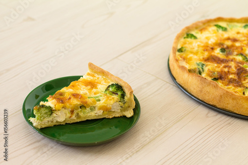 Wallpaper Mural Traditional French quiche Lorraine with chicken, egg, milk, cheese broccoli and corn on a wooden background. Torontodigital.ca