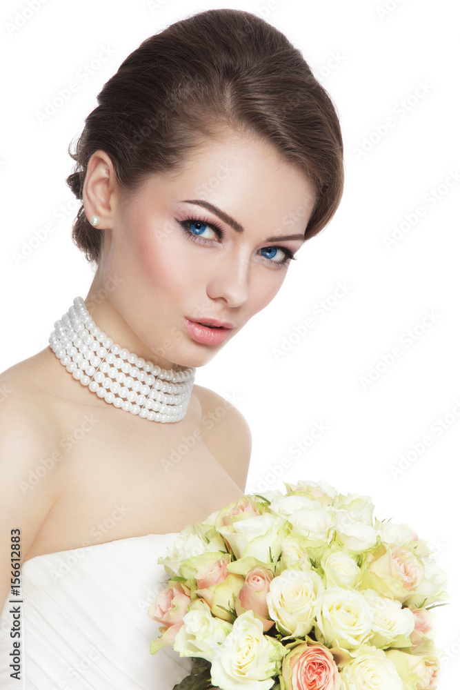 Young beautiful bride with stylish make-up and hairdo holding bouquet over white background, copy space Young beautiful bride with stylish make-up and hairdo holding bouquet over white background, copy space