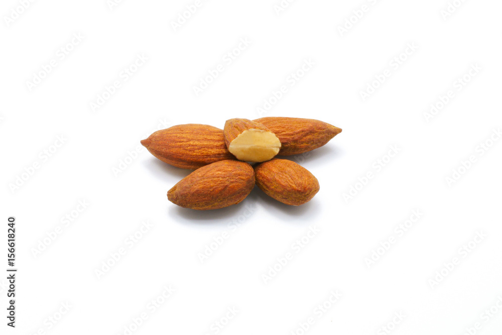 Group of roast almonds isolated on white background Group of roast almonds isolated on white background