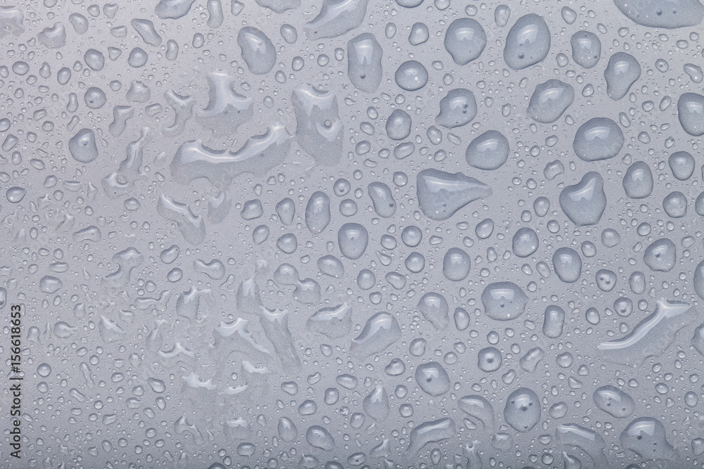Drops of water on a color background. Gray Drops of water on a color background. Gray