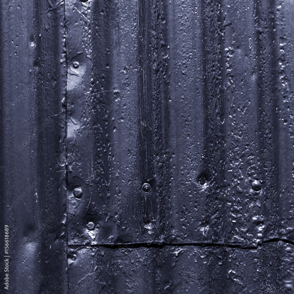 Texture of corrugated metal on the wall of traditional Iceland house for background. Toned Texture of corrugated metal on the wall of traditional Iceland house for background. Toned