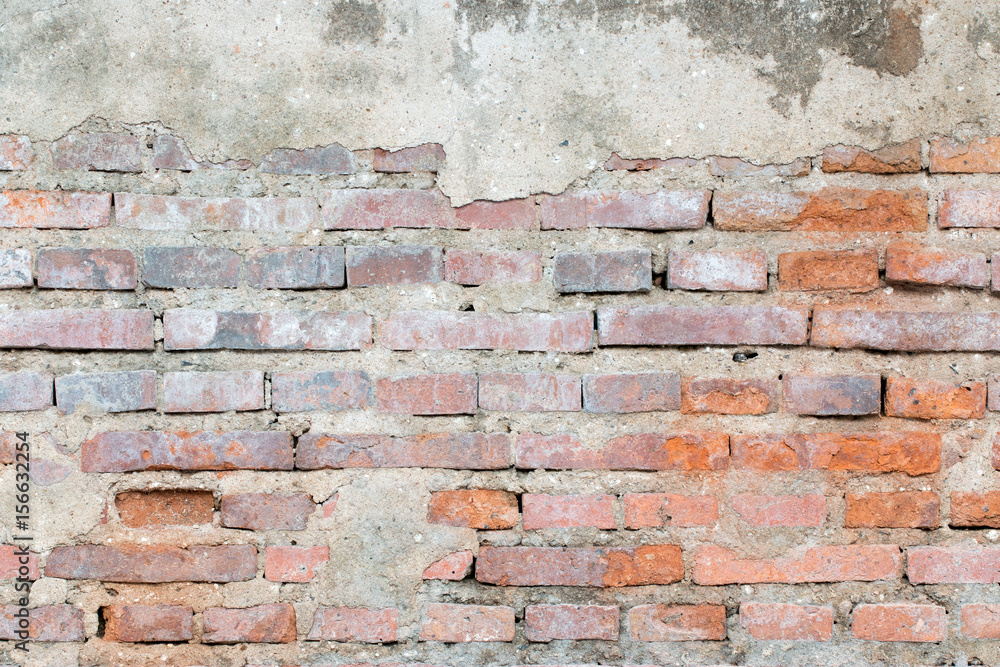 Obraz premium cracked concrete vintage brick wall background