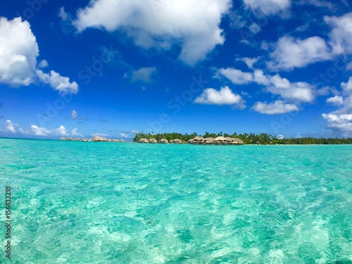 Overwater bungalows of a luxury resort at Tahaa, Tahiti, French Polynesia