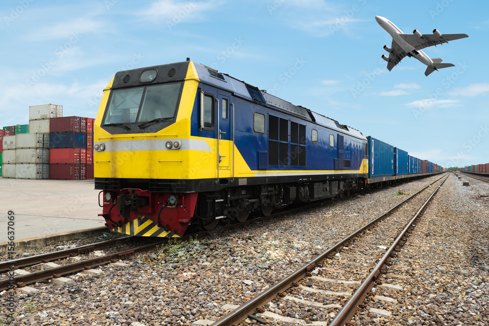 Cargo train platform with freight train container at depot use for Import, Export, Logistics background. Import, Export, Logistics concept. Cargo train platform with freight train container at depot use for Import, Export, Logistics background. Import, Export, Logistics concept.
