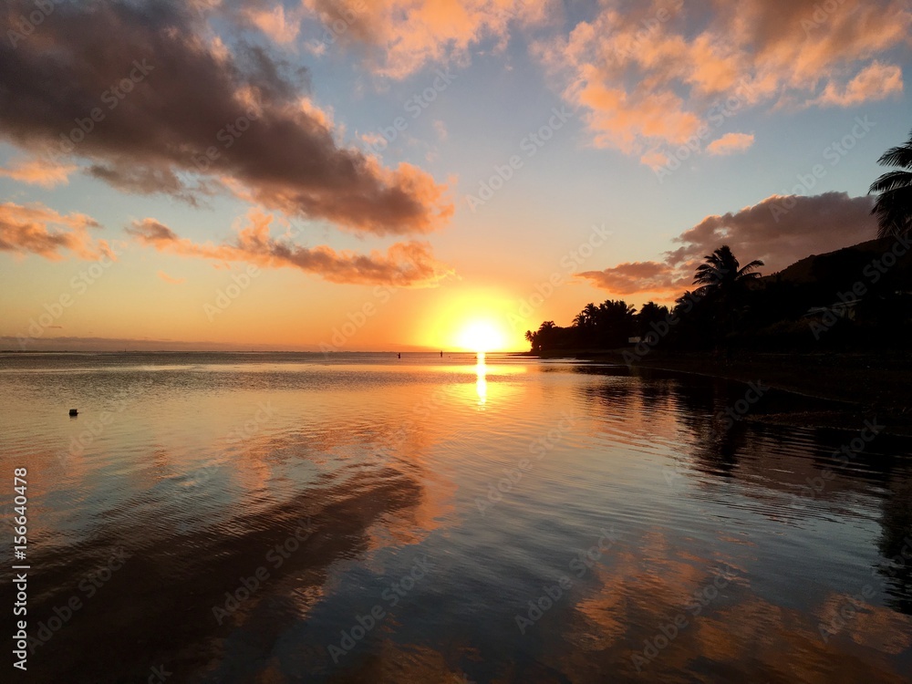 Beautiful sunset at the beach of Atimaono, Tahiti, French Polynesia