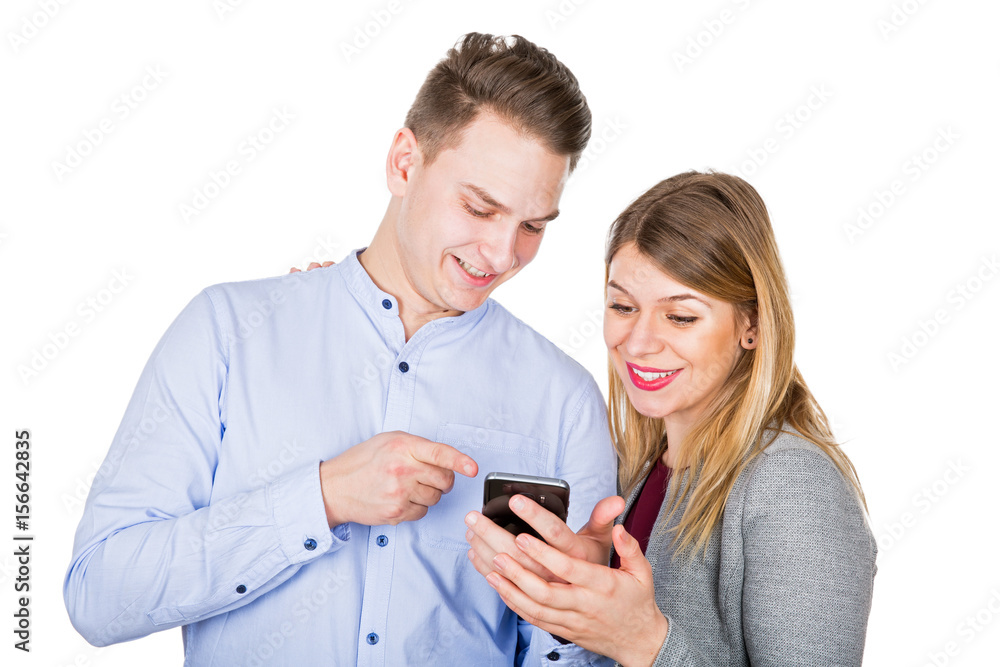 Young couple watching a video on mobile phone Young couple watching a video on mobile phone