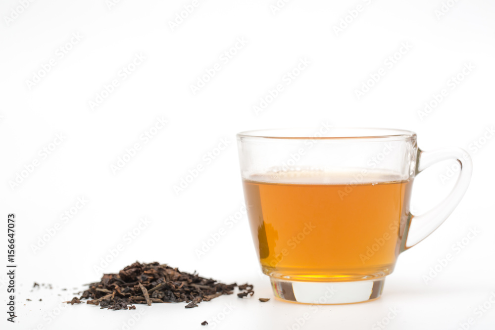 tea cup and tea leaves on white background tea cup and tea leaves on white background