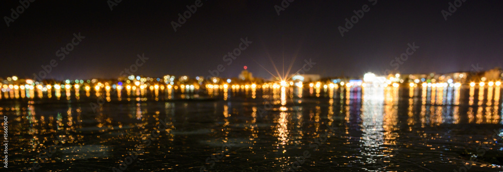 Iced lake at night city