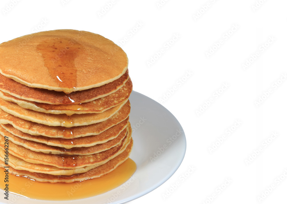 Stack of fresh made pancakes served with maple syrup, isolated on white background with free space for design and text Stack of fresh made pancakes served with maple syrup, isolated on white background with free space for design and text