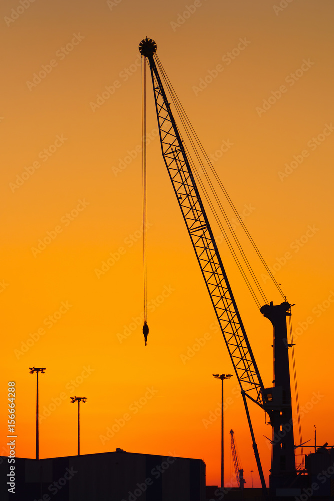 crane silhouette at sunset