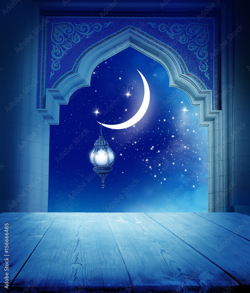 Naklejka premium Ramadan Kareem background..Mosque window with shiny crescent moon and wooden table