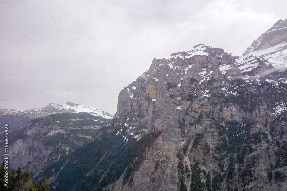 Fototapeta premium mountain at murren village cover with snow