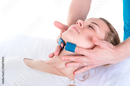 Medical cosmetic procedure. Mikronidling. Beautician performs Dermaroller procedure. Young woman having an injection mesotherapy cosmetic procedures in spa clinic.