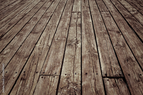 Vertical wooden planks fence boardwalk