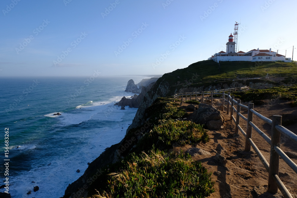 Cabo da Roca lighthouse at big rocky cliffs