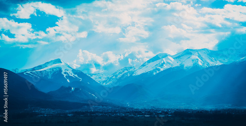 Wallpaper Mural Cloudy evening in Mountains Pirin, Bulgaria. Winter. View from Bansko city. Europe, Rila, Balkans. Torontodigital.ca