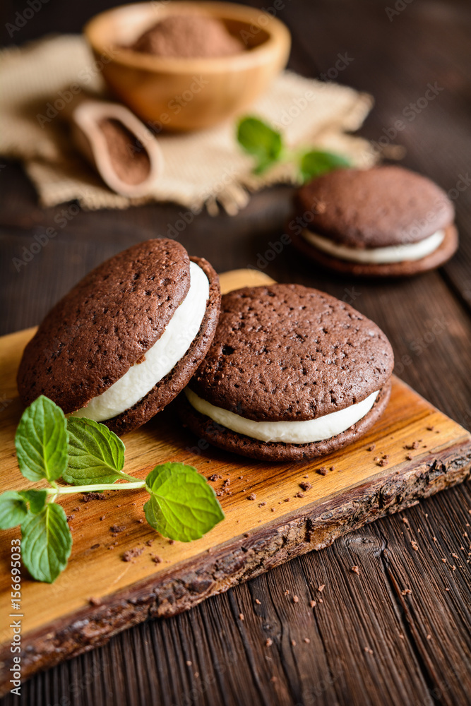 Traditional chocolate Whoopie pies filled with cream Traditional chocolate Whoopie pies filled with cream