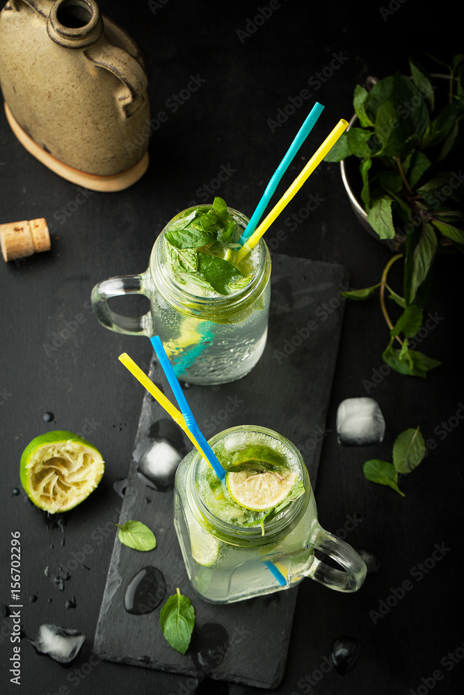 Mojito cocktail of fresh lime and mint with ice Mojito cocktail of fresh lime and mint with ice