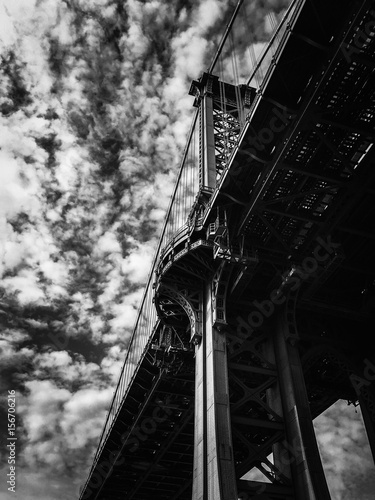 Manhattan bridge with cloudy sky in black and white style