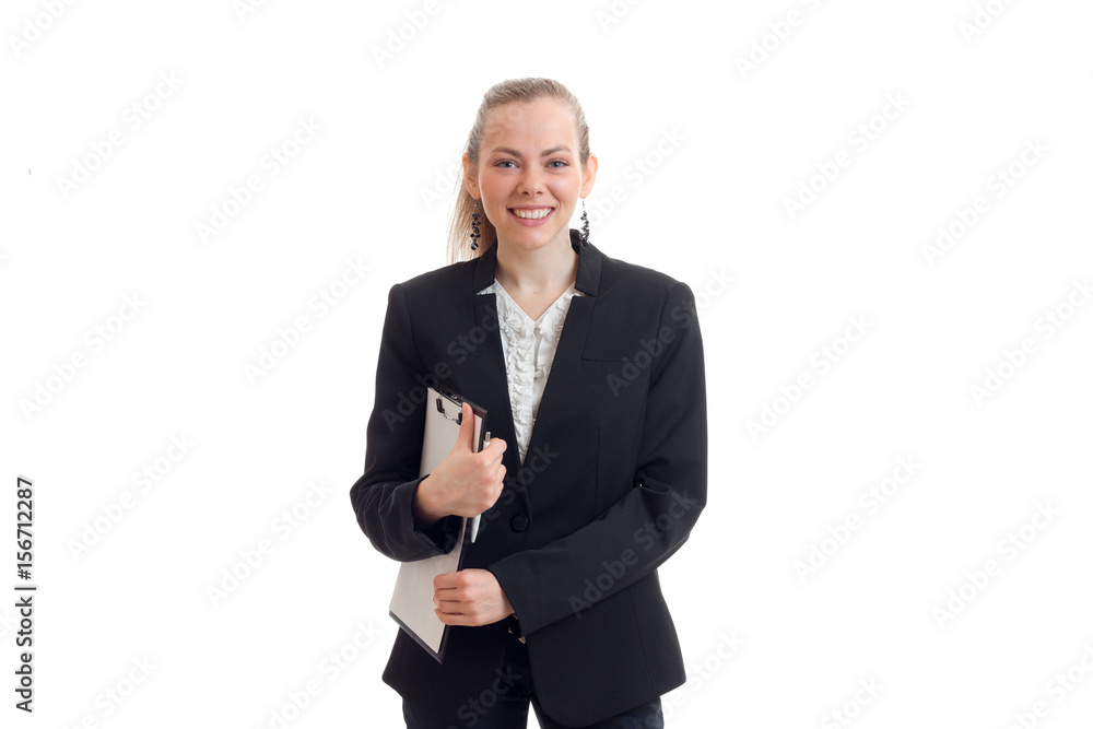 young business woman laughs, looks into the camera and holding a Tablet young business woman laughs, looks into the camera and holding a Tablet