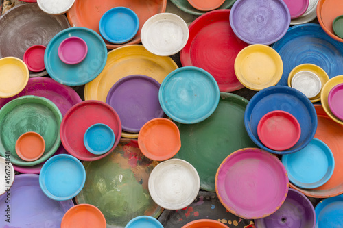 Colorful clay plates. Wall decoration.